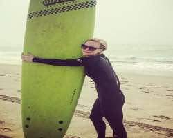 She enjoys surfing when off from work.